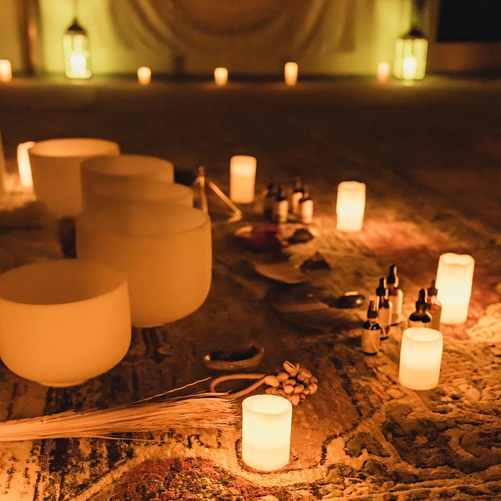 Close up view of crystal bowls and candles